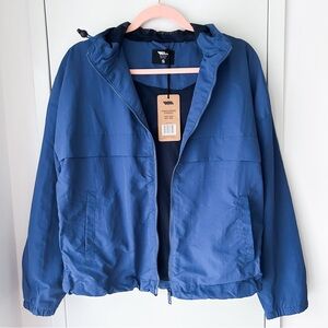 Blue windbreaker jacket